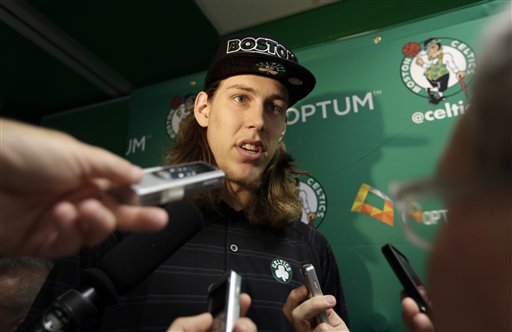 Boston Celtics 2013 NBA basketball draft pick Kelly Olynyk faces reporters following a news conference in Boston on July 1, 2013.