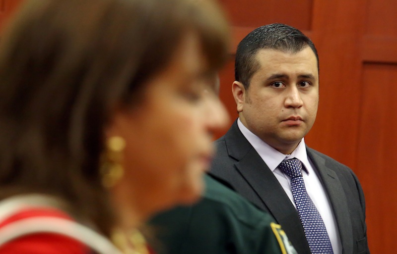 George Zimmerman looks at State Attorney Angela Corey, during a recess in his trial at the Seminole circuit court, in Sanford, Fla., Wednesday, July 3, 2013. Zimmerman is charged with second-degree murder in the fatal shooting of Trayvon Martin, an unarmed teen, in 2012. (AP Photo/Orlando Sentinel, Jacob Langston, Pool)