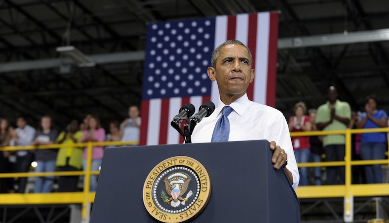 President Barack Obama speaks at the Amazon fulfillment center in Chattanooga, Tenn., Tuesday, July 30, 2013. Obama came to Chattanooga to give the first in a series of policy speeches on his proposals for private sector job growth and to strengthen the manufacturing sector. (AP Photo/Susan Walsh)