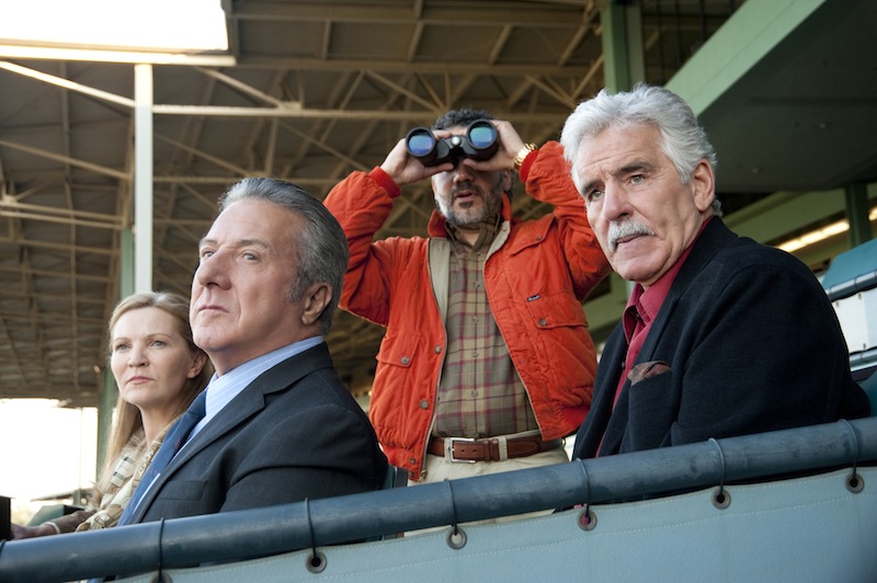 In this undated image released by HBO, from left, Joan Allen, Dustin Hoffman, John Ortiz and Dennis Farina are shown in a scene from the HBO original series "Luck." Farina died suddenly on Monday, July 22, 2013, in Scottsdale, AZriz., after suffering a blood clot in his lung. He was 69. (AP Photo/HBO, Gusmano Cesaretti, File )