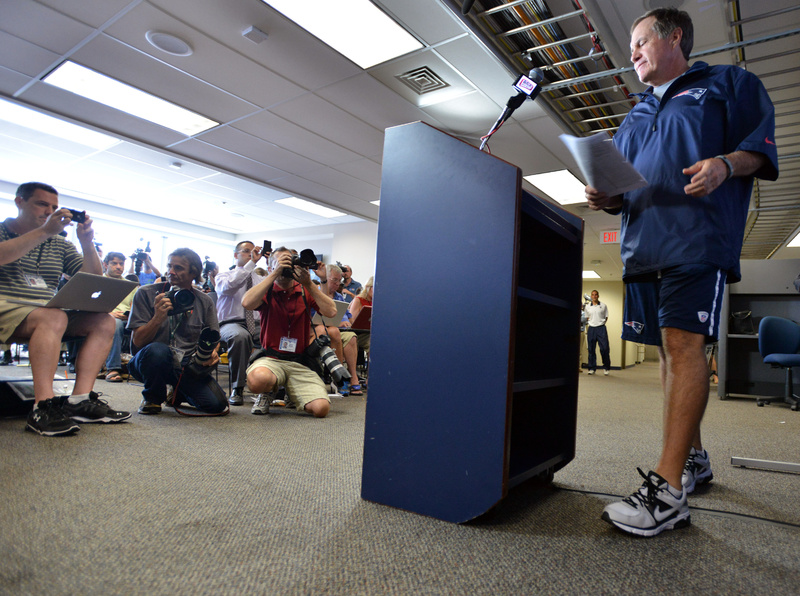 New England Patriots head coach Bill Belichick arrives to speak to reporters in Foxborough, Mass., on Wednesday.