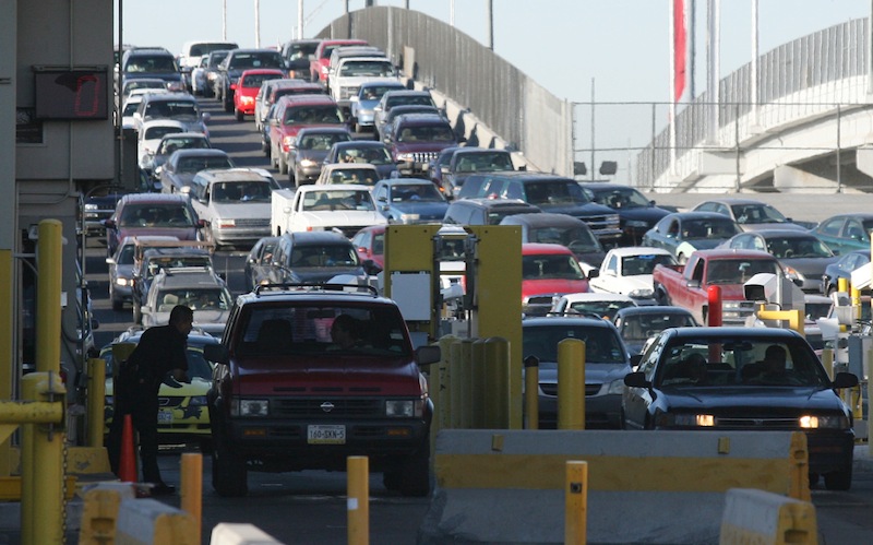 In this Monday, June 1, 2009 file photo, traffic lines up to enter the United States at the Bridge of the Americas port-of-entry in El Paso, Texas. A Vermont ski area near the Canadian border is willing to pay the U.S. Homeland Security Department to ensure there are enough customs agents at the border on weekends so that Canadian skiers don't have to wait. It's part of a pilot program taking place at certain ports of entry around the country. (AP Photo/Victor Calzada, File)
