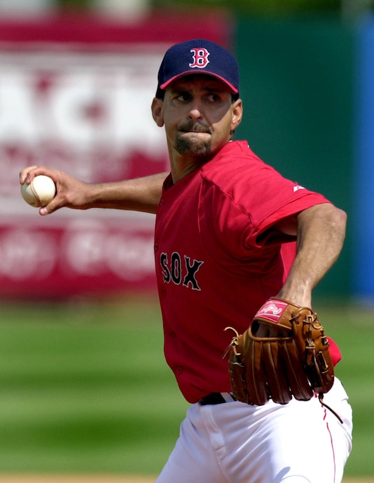 In this 2003 file photo, Boston Red Sox pitcher Frank Castillo pitches during Spring Training. Authorities say Castillo, 44, who had multiple stints with the Red Sox, was found dead in a lake northeast of Phoenix. (AP Photo/Charles Krupa) Baseball