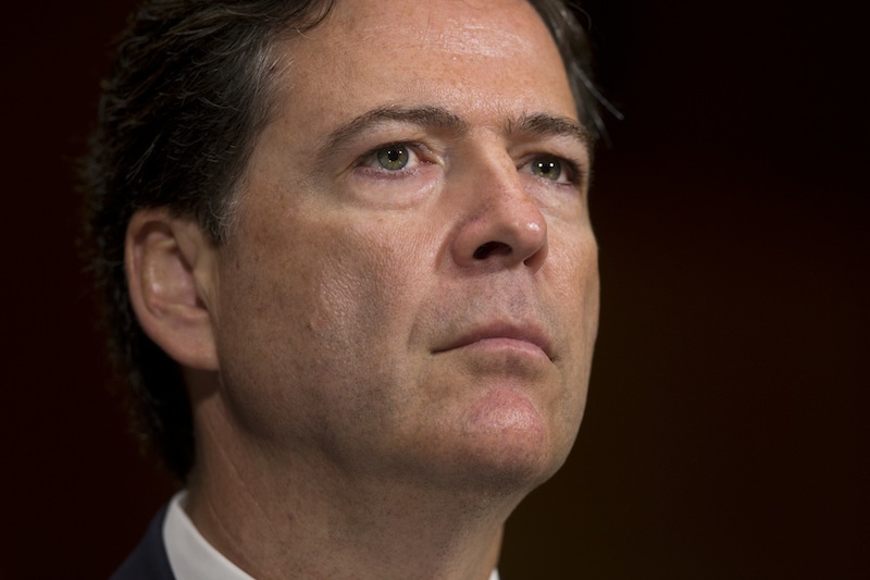 In this July 9. 2013 file photo, FBI director nominee James Comey testifies during a Senate Judiciary Committee in Washington. The Senate Judiciary Committee has unanimously approved the nomination of James Comey to be director of the FBI, clearing the way for a full Senate vote. (AP Photo/Evan Vucci)