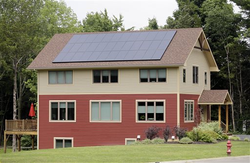 Solar panels generate electricity for this zero net energy home in New Paltz, N.Y. It is designed to reduce energy consumption through the use of energy-efficient appliances and insulation.