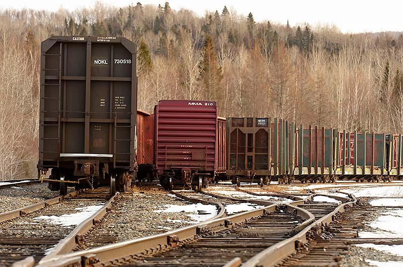 In this Feb. 19, 2010 file photo, rail cars sit idled on the Montreal, Maine & Atlantic Railway junction in Oakfield, Maine.