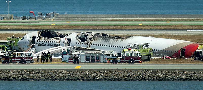 Fire crews respond to the scene where Asiana Flight 214 crashed at San Francisco International Airport on Saturday in San Francisco.
