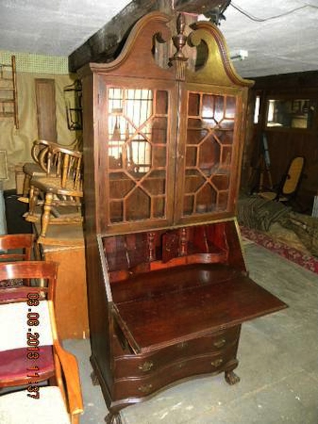 Alex MacPhail said the burglars cut the lock to his unit and stole antique furniture, memorabilia, personal photographs, jewelry and family heirlooms, including an antique, 7-foot-tall Governor Winthrop desk. Above, a replica of the stolen desk.