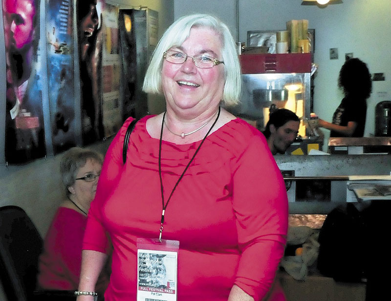 Pat Clark of Unity enters the Railroad Square Cinema to see a Maine International Film Festival movie Sunday.