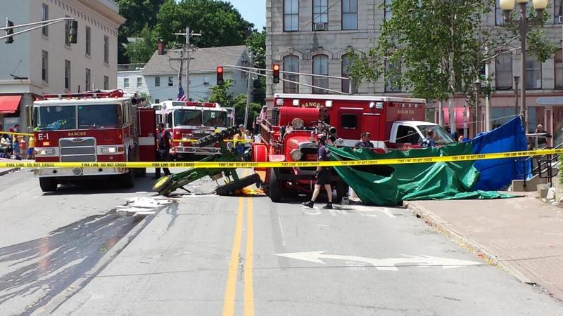 The scene on Water Street in Bangor on Thursday following an accident that killed a man riding a tractor in the July Fourth parade. (Photo courtesy WABITV.)