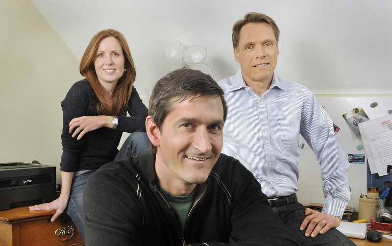 Portland residents, from left, Kate and Colin Snyder and Robert Bruce are running BoodleUP, which invites users to win prizes from advertisers.