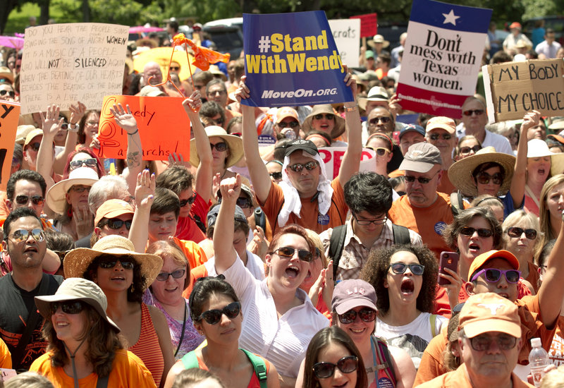 Abortion rights supporters rally at the state Capitol in Austin, Texas, on Monday. The Texas Senate has convened for a special session to take up an abortion restrictions bill.