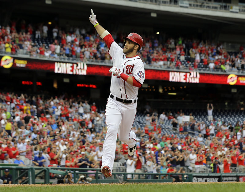 Bryce Harper of the Nationals celebrates after hitting a homer in the first inning Monday night at Washington. Harper homered on his first swing off the disabled list.