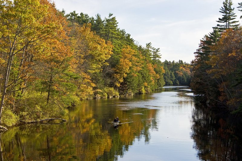 A couple canoes on the Saco River in Hollis in 2007. This stretch of land is known as Indian Cellar because Native Americans once stored their food in caves along a deep gorge there. Land for Maine’s Future helped the town buy the property to protect it from development. Gov. LePage’s refusal in 2012 to issue voter-approved LMF bonds has held up similar projects.