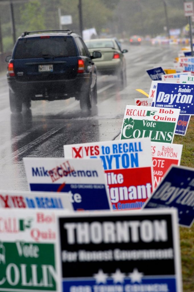 Vehicles pass political signs put up by candidates for office in the June 11 Old Orchard Beach recall election. The success of the Recall 4 effort proves that voters will respond when the issues are explained to them, an Old Orchard Beach resident says.