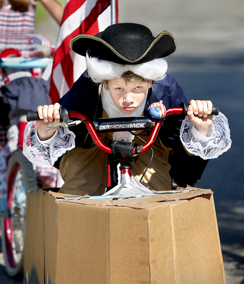Sam Robles of Ecuador dressed as George Washington and converted his bike into a boat for the decorated bike contest held before the 63rd annual main event in Ocean Park. Sam won first prize in his age group.