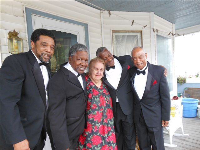 Members of the legendary R&B group the Drifters visit with longtime fan Yvonne Gretta of Sanford on the afternoon of the group’s July 1 concert. Gretta, a lifelong fan, was unable to attend the concert so the group surprised her.