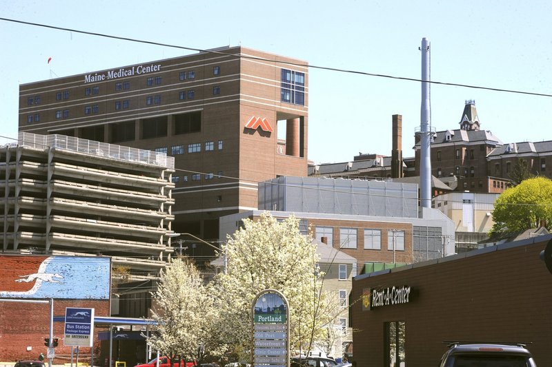 Maine Medical Center in Portland, which announced a hiring freeze in the spring, began offering voluntary retirement buyouts to 400 employees about two weeks ago, citing a $13.4 million operating loss in the first half of its fiscal year.