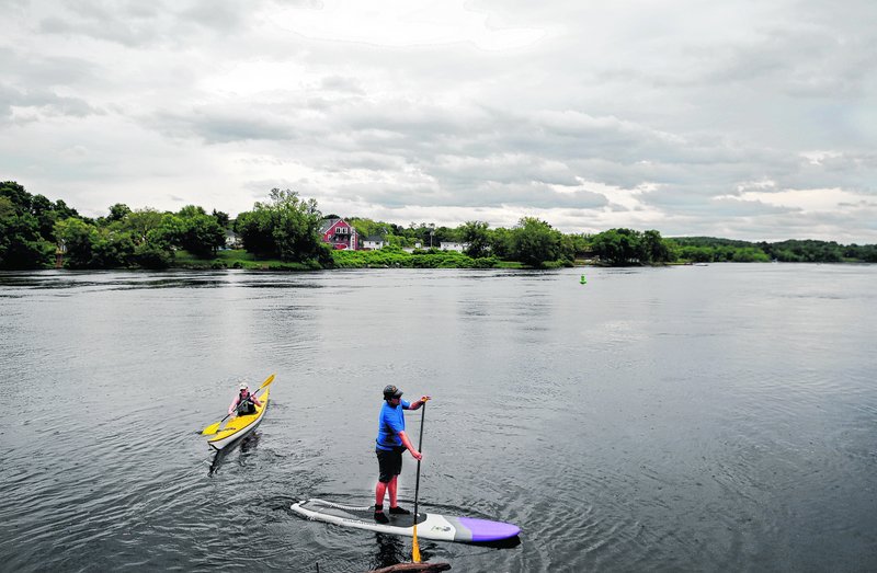 Paddlers on the Kennebec River in Gardiner enjoy a slice of outdoors space that is underused, some say.
