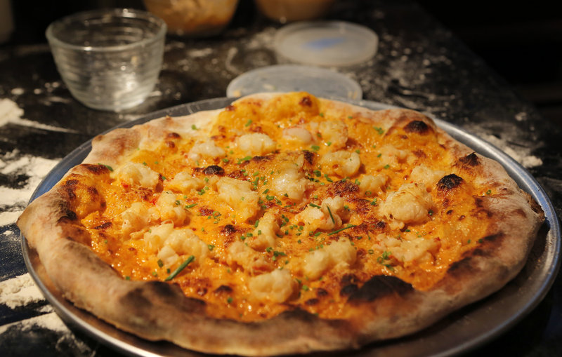 Prepared for the class is a lobster pizza topped with her own lobster cream sauce.