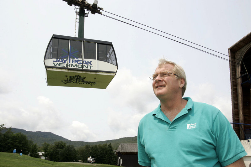In this July 7, 2006 file photo, Jay Peak president Bill Stenger stands at the resort in Jay, Vt. The Vermont ski area near the Canadian border is willing to pay the U.S. Homeland Security Department to ensure there are enough customs agents at the border on weekends so that Canadian skiers don't have to wait. It's part of a pilot program taking place at certain ports of entry around the country. (AP Photo/Alden Pellett)