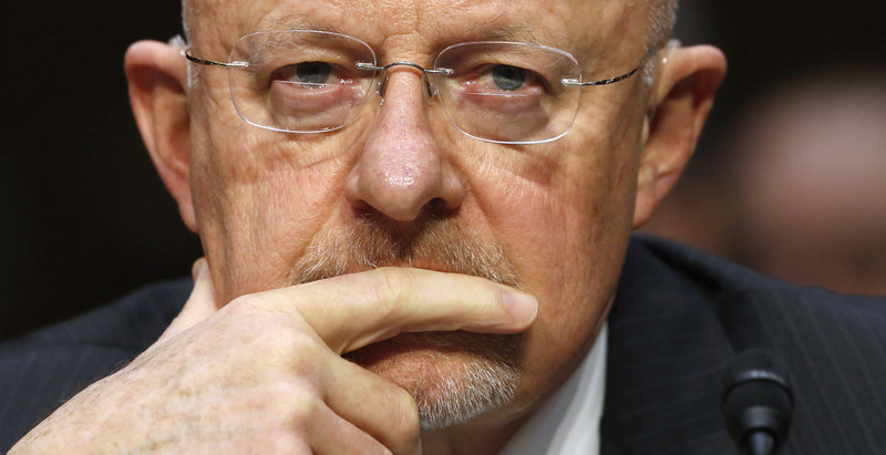 Director of National Intelligence James Clapper testifies March 12 before a Senate Intelligence Committee hearing on national security threats. He testified that the government was not collecting data on millions of Americans, but later said he misspoke.