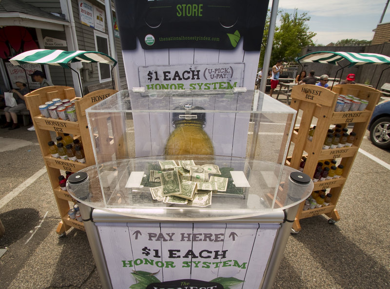 As part of a social experiment to see how honest people are when nobody is looking, Honest Tea placed an honor system booth on Western Avenue in Lower Village, Kennebunk, and observed from across the street on Friday, July 12, 2013.