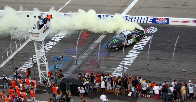 Kyle Busch does a burnout Saturday at New Hampshire Motor Speedway after earning his seventh Nationwide Series win of the season.