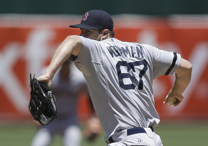 Brandon Workman retires the A’s in the first inning of what proves to be an impressive major league debut, albeit one that the Red Sox couldn’t win. He didn’t allow a hit until the seventh.