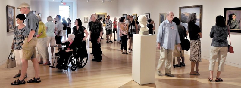 There were more patrons than art pieces in one of the sections of the expanded Colby College Museum of Art in Waterville on Sunday, when a special community celebration of the museum was held.