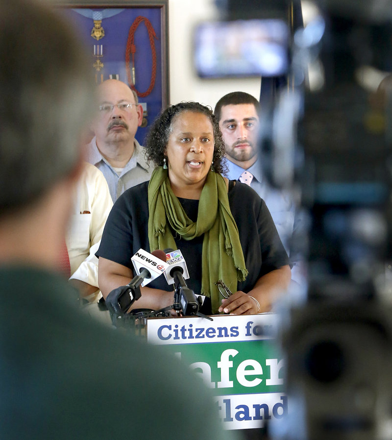 Regina Phillips, a NAACP of Maine board member, speaks during news conference Monday at City Hall to promote making marijuana legal in Portland. Voters will decide the issue Nov. 5 after the City Council rejected an opportunity to legalize it Monday night.