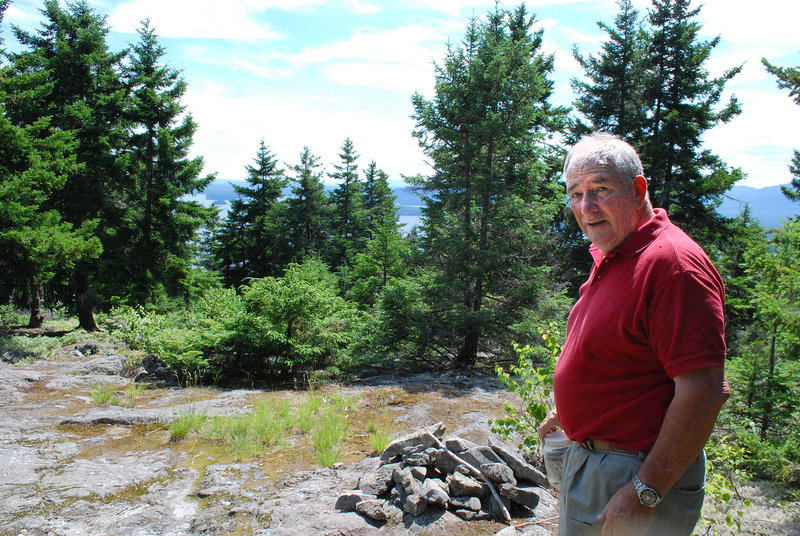 Forester Hank McPherson, owner of Burnt Mountain, welcomes the public to explore and enjoy nature on the 1,800 acres he’s developing beside Moosehead Lake.