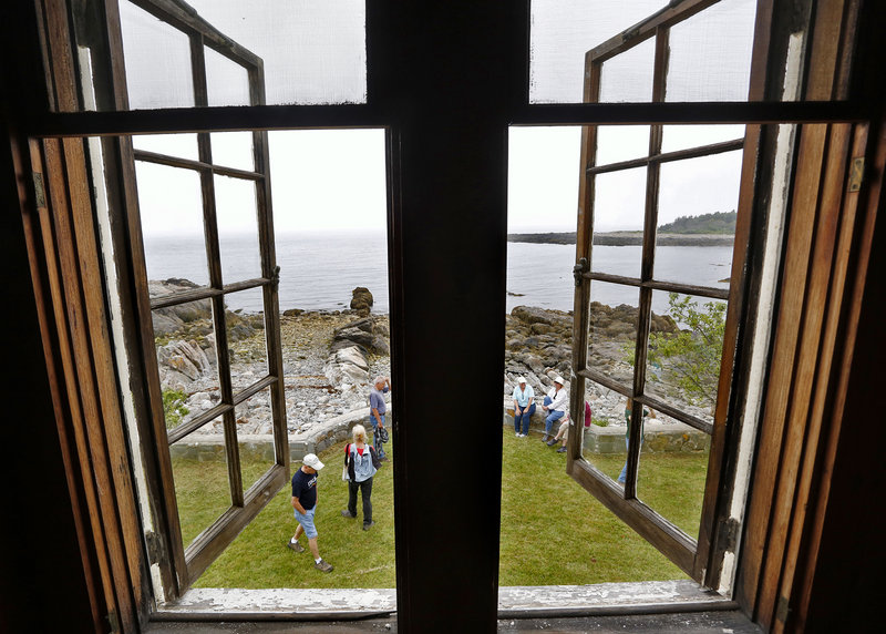 Visitors take a tour of the buildings at Timber Point in the Rachel Carson Wildlife Refuge in Biddeford in 2013.