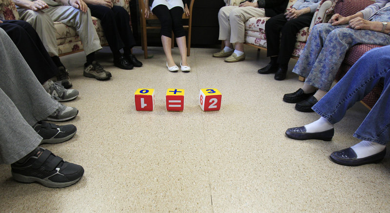 People attend memory training at a community center in Hong Kong. Noticing you have had a decline beyond the occasional misplaced car keys or forgotten name could be the very earliest sign of Alzheimer’s, several research teams are reporting.