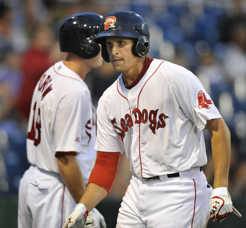 Garin Cecchini scored the first run Thursday night for the Sea Dogs, hitting a triple and then crossing the plate when an errant throw went into the Reading dugout.
