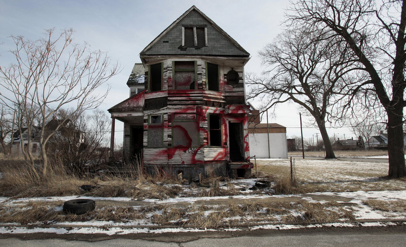 A vacant and blighted home sits alone in an east side neighborhood once full of homes in Detroit on Jan. 27. The story of Detroit’s decline is decades old: Its tax revenue and population have shrunk and labor costs have remained high.