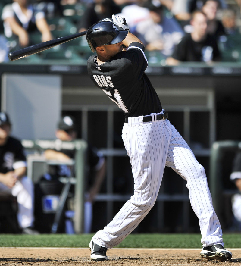 Alex Rios of the host Chicago White Sox connects with a third-inning grand slam in Saturday’s 10-6 victory over the Atlanta Braves.