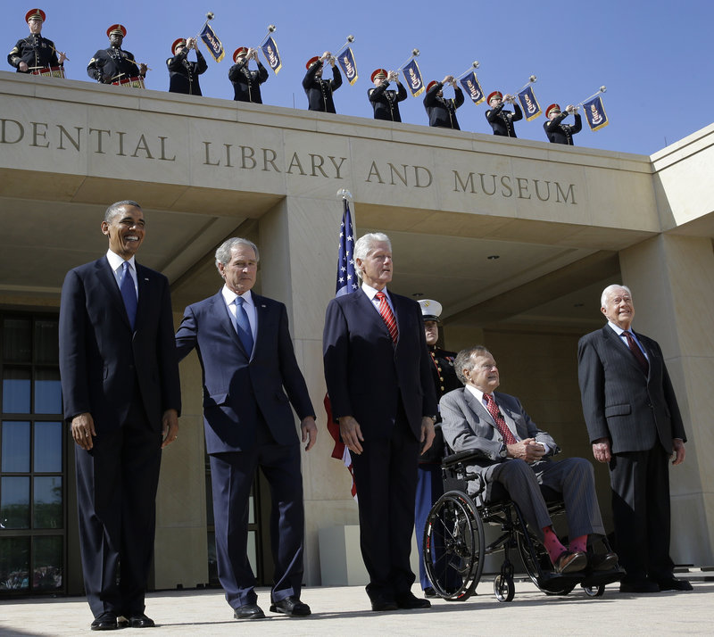 Five American leaders appear together at a dedication ceremony in Dallas on April 25. From left are President Obama and four former presidents, George W. Bush, Bill Clinton, George H.W. Bush and Jimmy Carter.