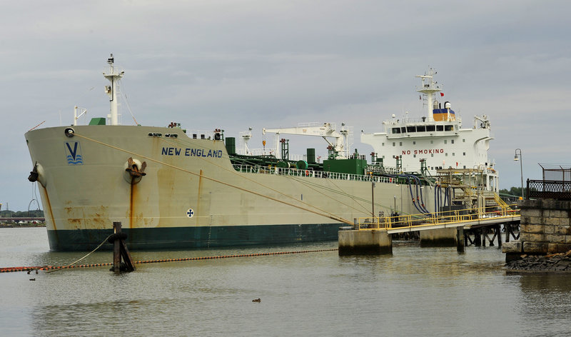 An oil tanker unloads at a terminal facility in South Portland on Thursday. The city’s terminals made Portland Harbor the second largest oil port on the East Coast in 2012.
