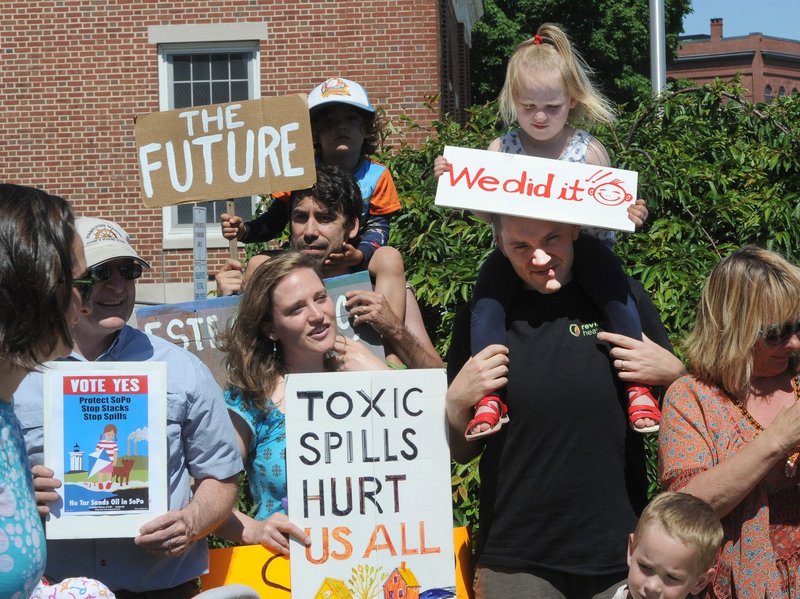 Members of the Concerned Citizens of South Portland attend a June news conference after collecting enough signatures to get a referendum on the ballot to block the passage of so-called tar sands oil through the city.