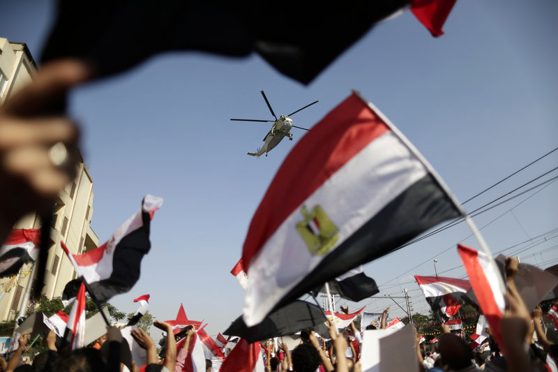 Demonstrators turn out in the hundreds of thousands to show support for the Egyptian army Friday. Crowds supporting ousted President Mohammed Morsi also rallied, but their presence was stifled by the military.