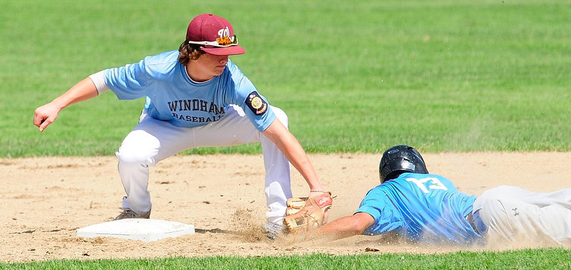 Second baseman Tanner Laberge of the Windham American Legion team tags Derek Leblanc of Madison during their state tournament play-in game Saturday. Windham won 12-4 and will meet Westbrook in the first round.