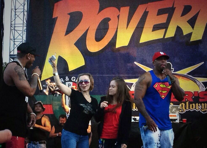 Amanda Berry, wearing sunglasses, makes a surprise appearance at the RoverFest concert in Cleveland on Saturday, one day after her captor, Ariel Castro, pleaded guilty.