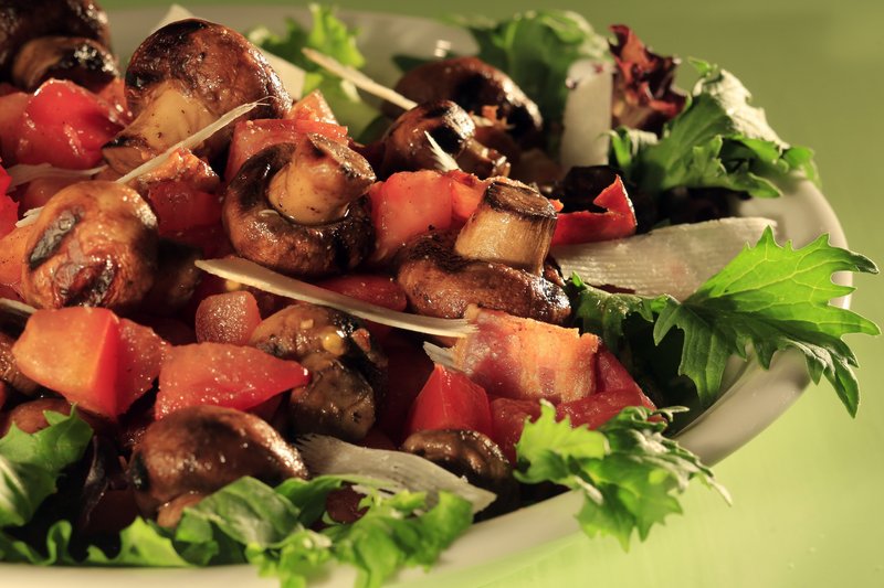 Above: Foods naturally laden with glutamate give this Tomato-Crimini Mushroom and Bacon Salad a flavor punch.