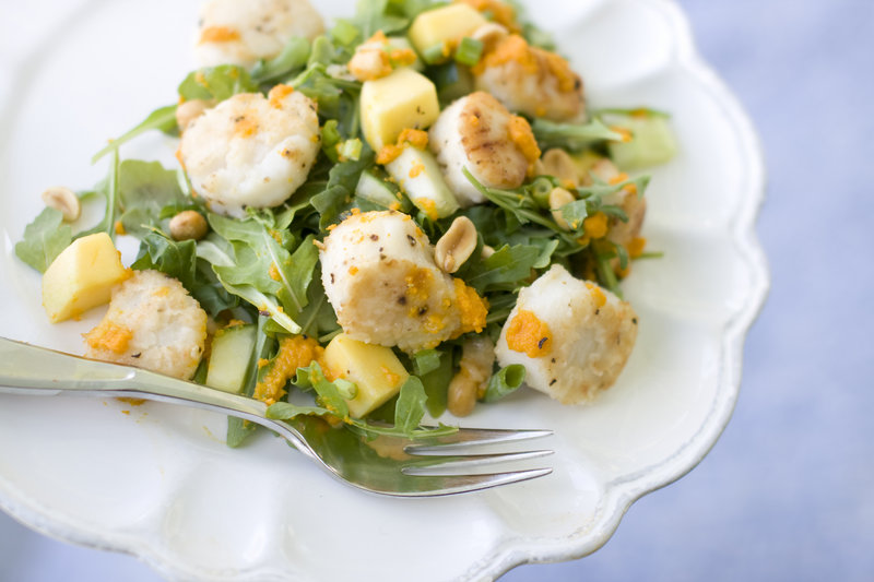 Warm scallops mix well with a carrot-ginger dressing, cucumber and mango in a salad.