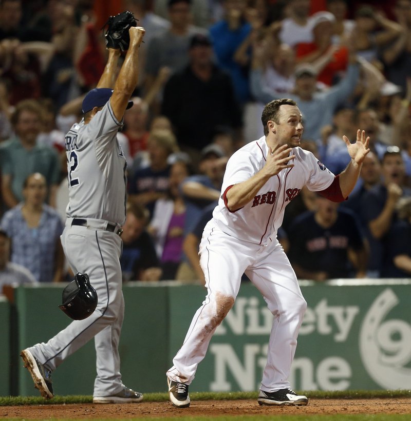 Daniel Nava can’t believe he was called out at home by umpire Jerry Meals in the eighth inning Monday night while trying to score from third on a sacrifice fly. The Sox lost to the Rays, 2-1.