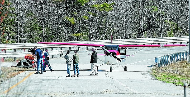 In this April 26 file photo, Dan Dufault was forced to land a Maine Warden Service plane on Interstate 95. Dufault has resigned from the Service.