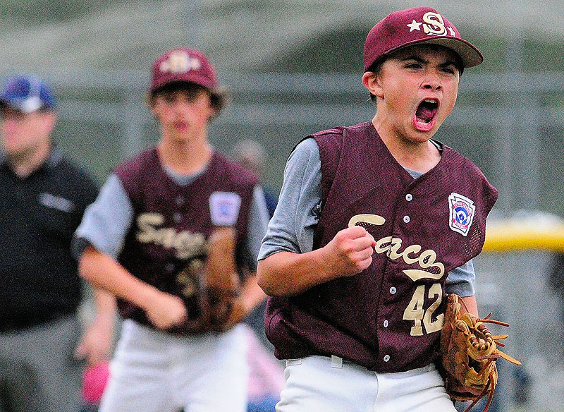 Saco pitcher Luke Chessie celebrates after his team beat Bayside 14-1 to win the Maine State 11/12 Little League championship game on Friday at Linscott Field in Augusta,