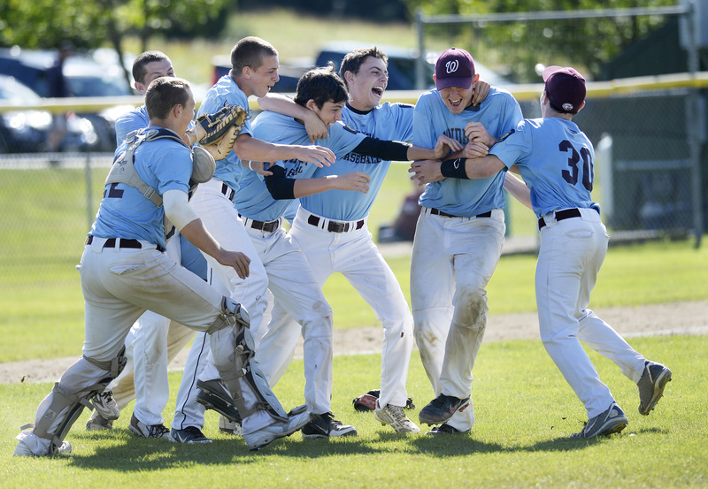 Windham players celebrate their state championship victory in American Legion Baseball after they defeated Westbrook on Monday.