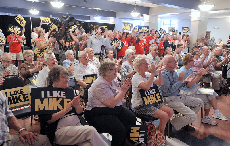 Supporters applaud during a news conference at which U.S. Rep. Mike Michaud announced his candidacy for governor at the Franco-American Heritage Center in Lewiston on Thursday.
